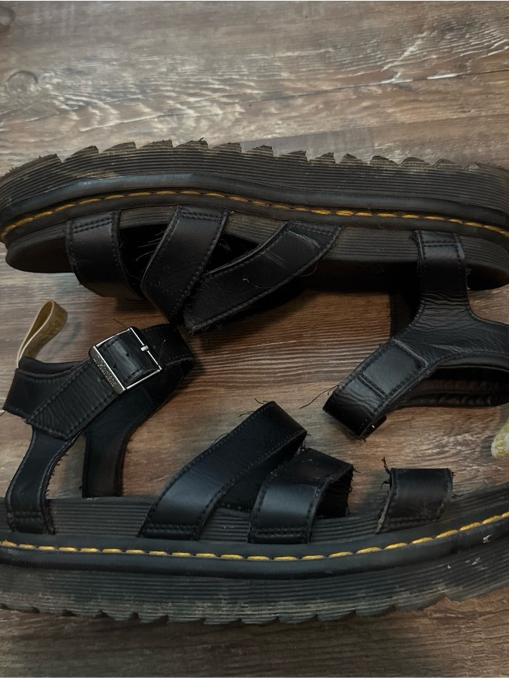 Dr. Martens Black Vegan Leather Buckle Lug Sandals with Yellow Stitching